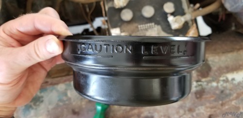 Air filter pan caution